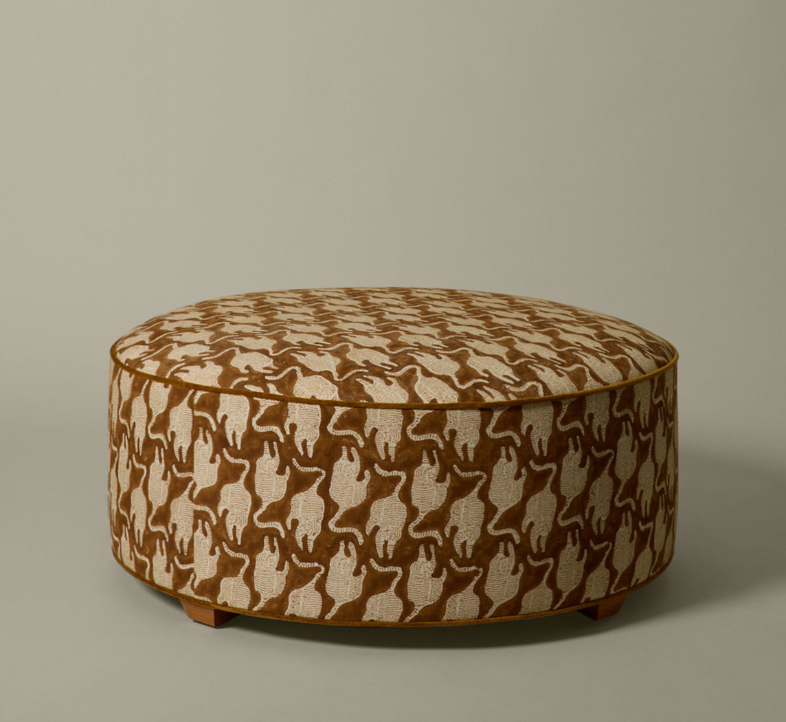 PIERCE & WARD CIRCLE OTTOMAN IN VINTAGE TIGER BLOCK PRINT
