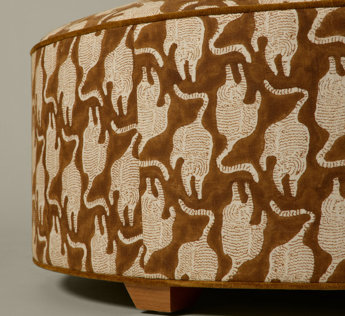 PIERCE & WARD CIRCLE OTTOMAN IN VINTAGE TIGER BLOCK PRINT