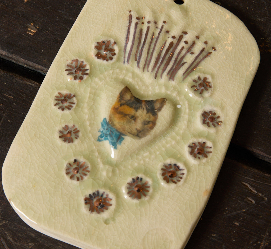 BUDDY WALL CHARM BY TINA CHARAD