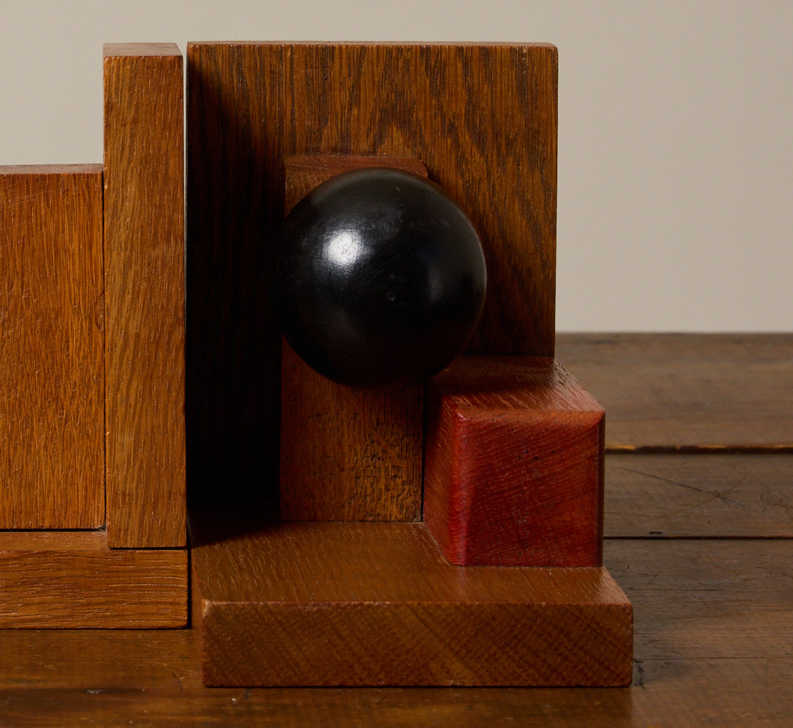 PAIR OF 1920S AMSTERDAM SCHOOL GEOMETRIC OAK BOOKENDS