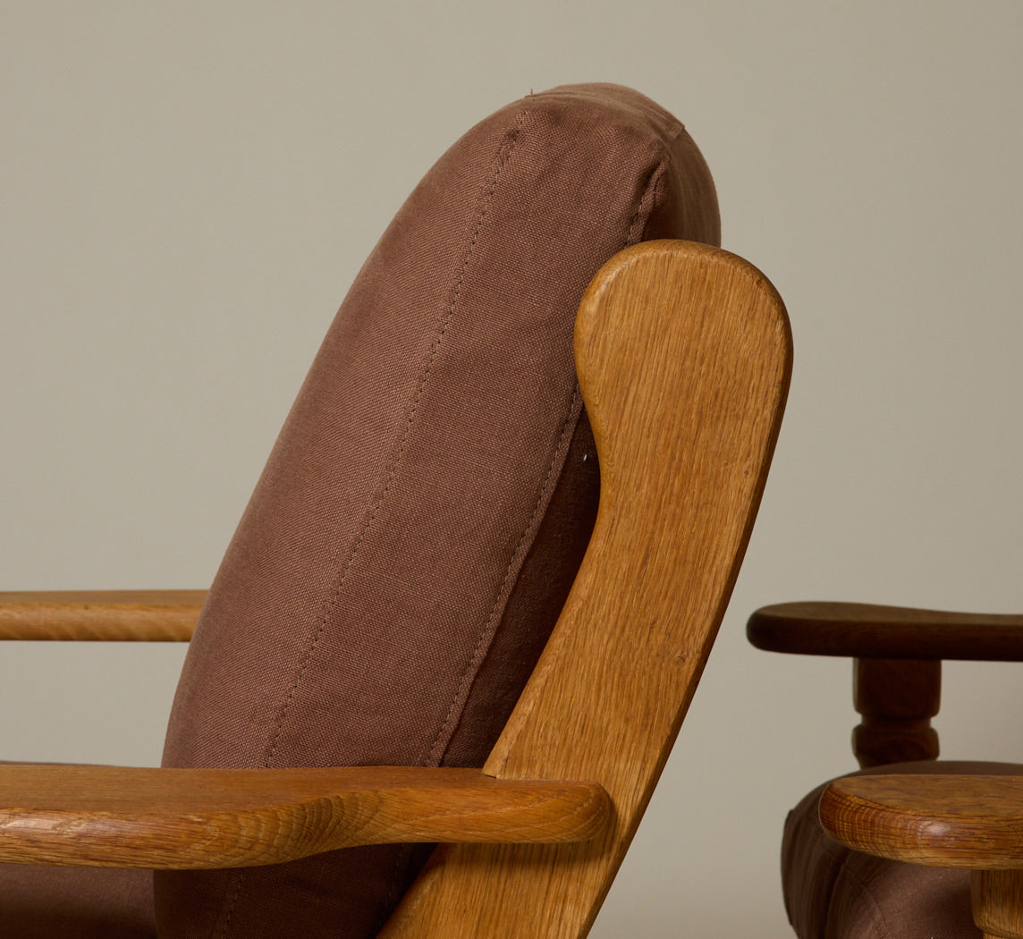 PAIR OF 1960S DANISH “HIS AND HERS” OAK LOUNGE CHAIRS IN THE STYLE OF HENNING KJAERNULF