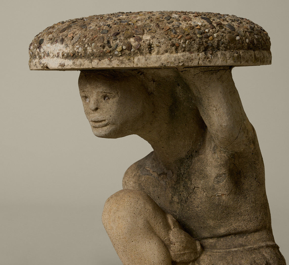 PAIR OF MID CENTURY FRENCH FIGURAL CAST STONE GARDEN TABLE WITH STONE AGGREGATE TOPS