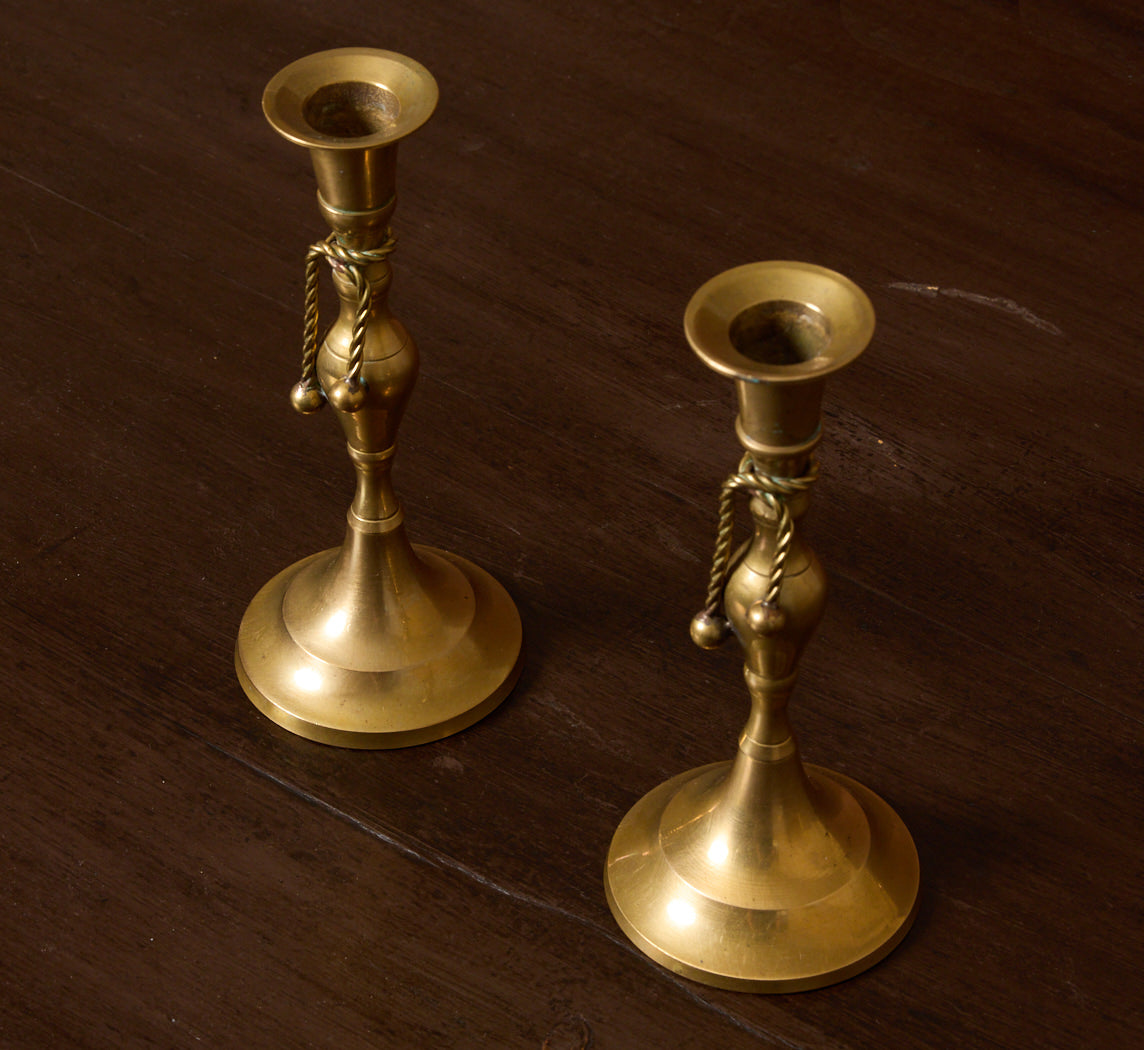PAIR OF BRASS CANDLESTICK HOLDERS WITH ROPE TASSEL
