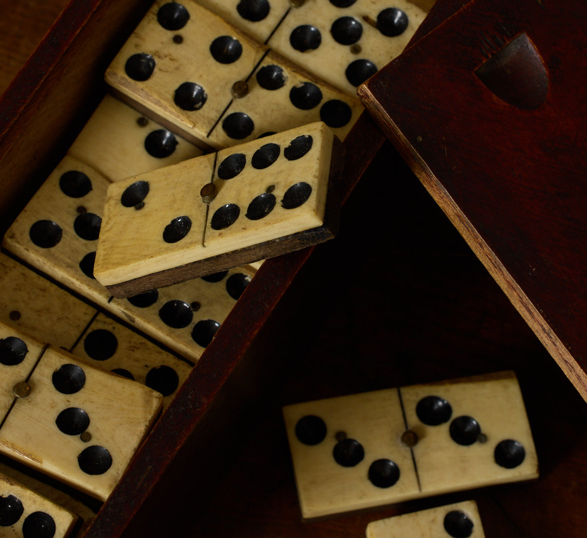 19TH CENTURY BONE AND EBONY DOMINOES SET IN ORIGINAL BOX