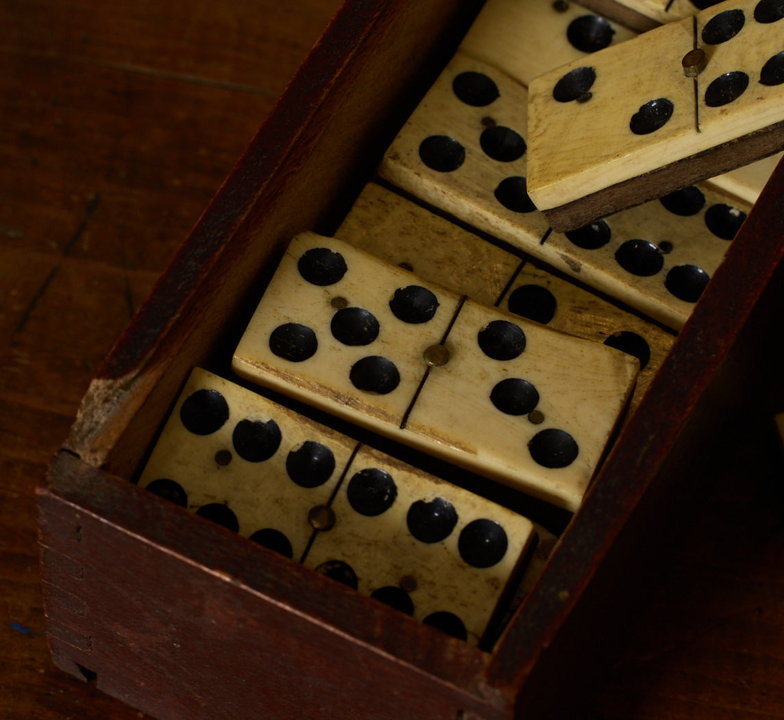 19TH CENTURY BONE AND EBONY DOMINOES SET IN ORIGINAL BOX