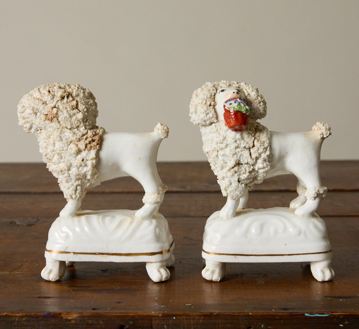 PAIR OF ENGLISH STAFFORDSHIRE POODLE DOG