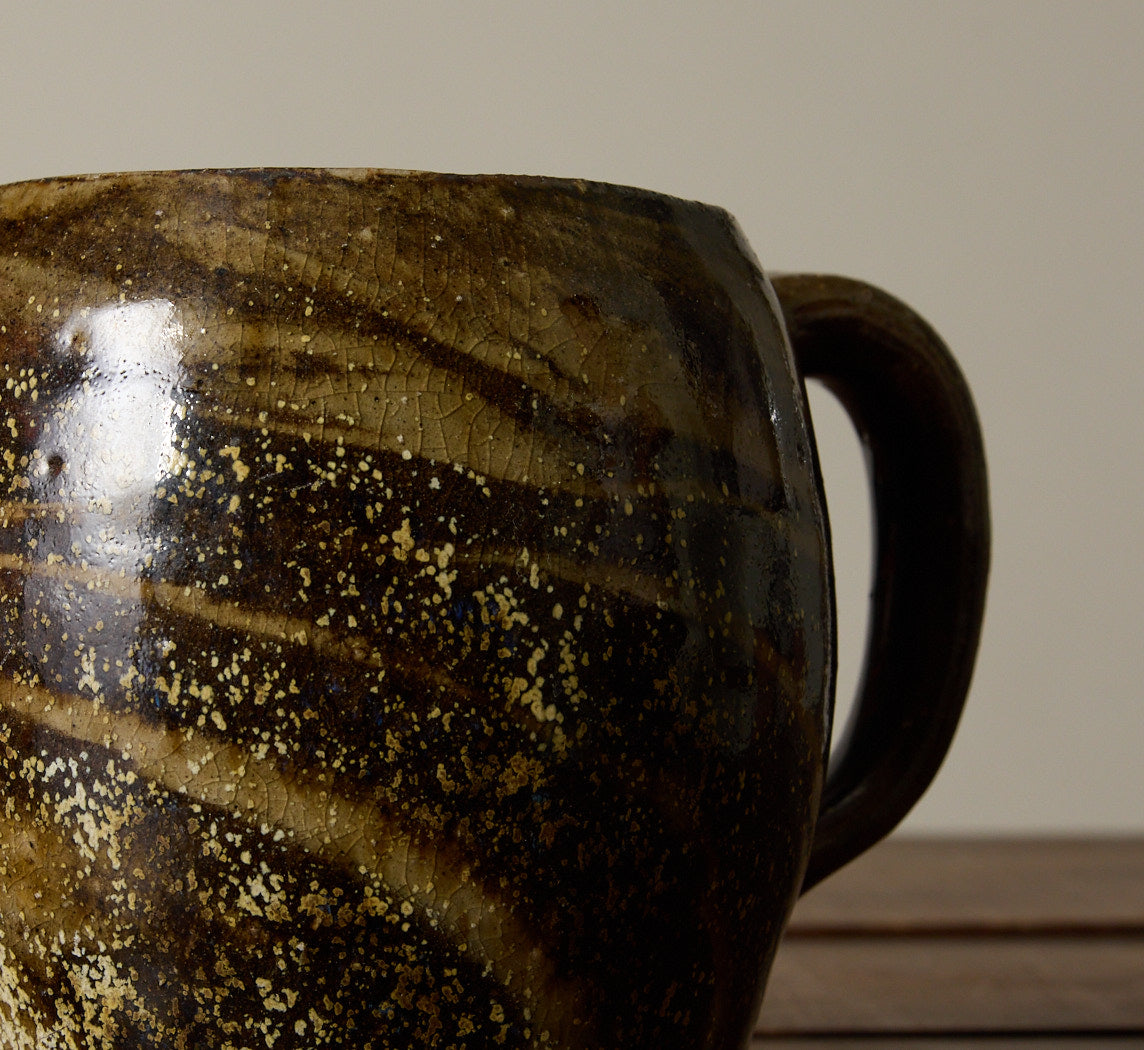 PAIR OF EARTHENWARE SWIRL MUGS