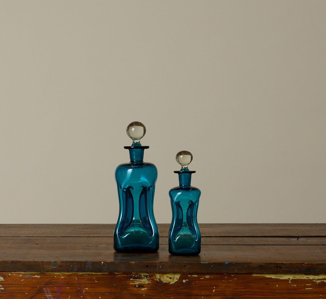 PAIR OF MID CENTURY BLUE GLASS DECANTERS