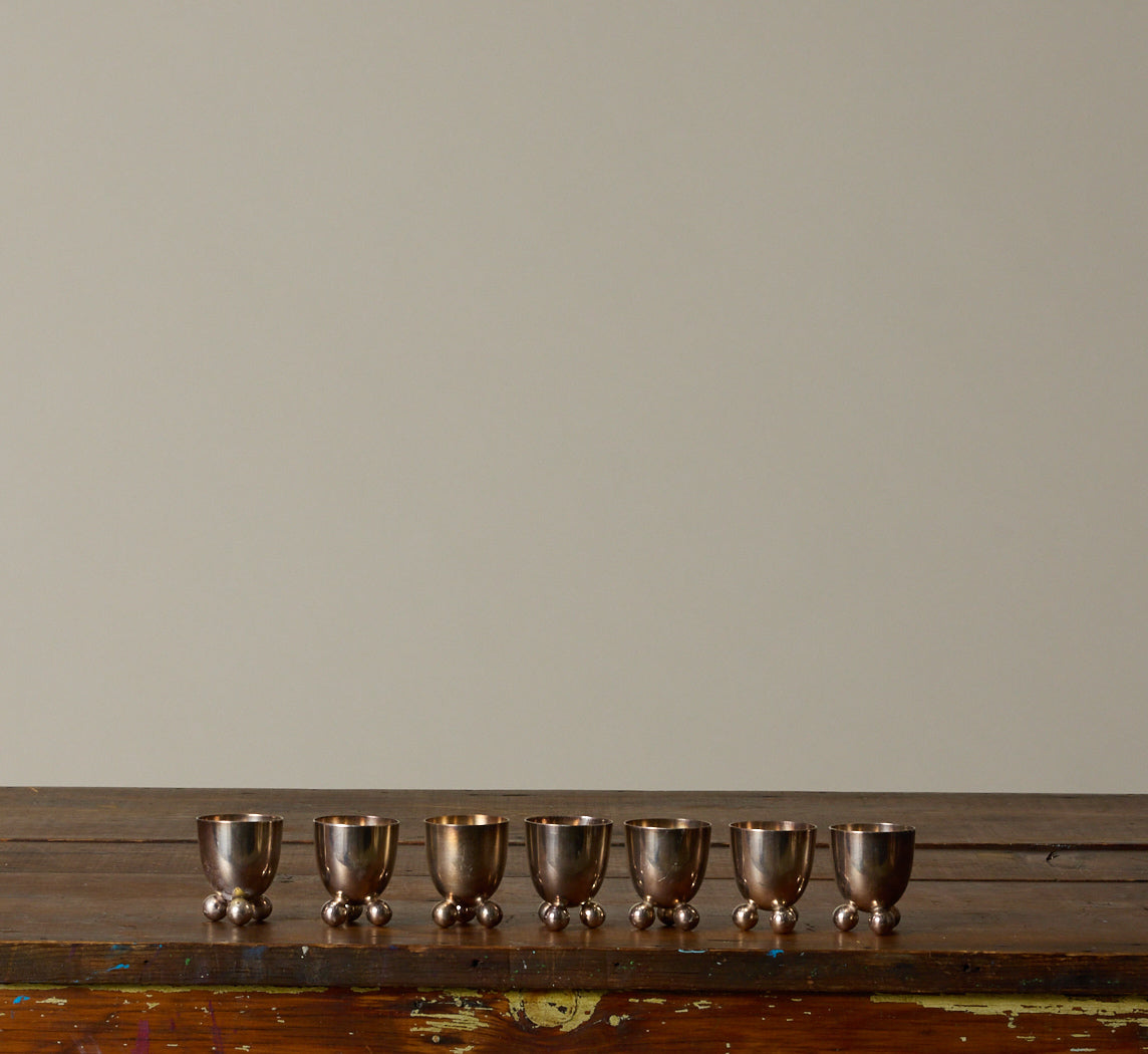 SET OF 7 SILVER PLATED EGG HOLDERS