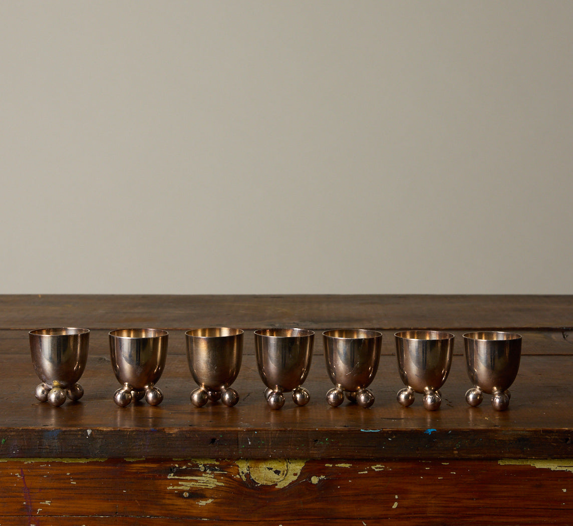 SET OF 7 SILVER PLATED EGG HOLDERS