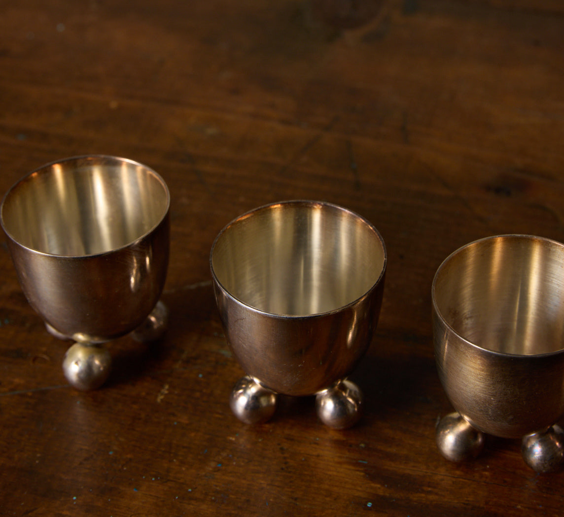 SET OF 7 SILVER PLATED EGG HOLDERS