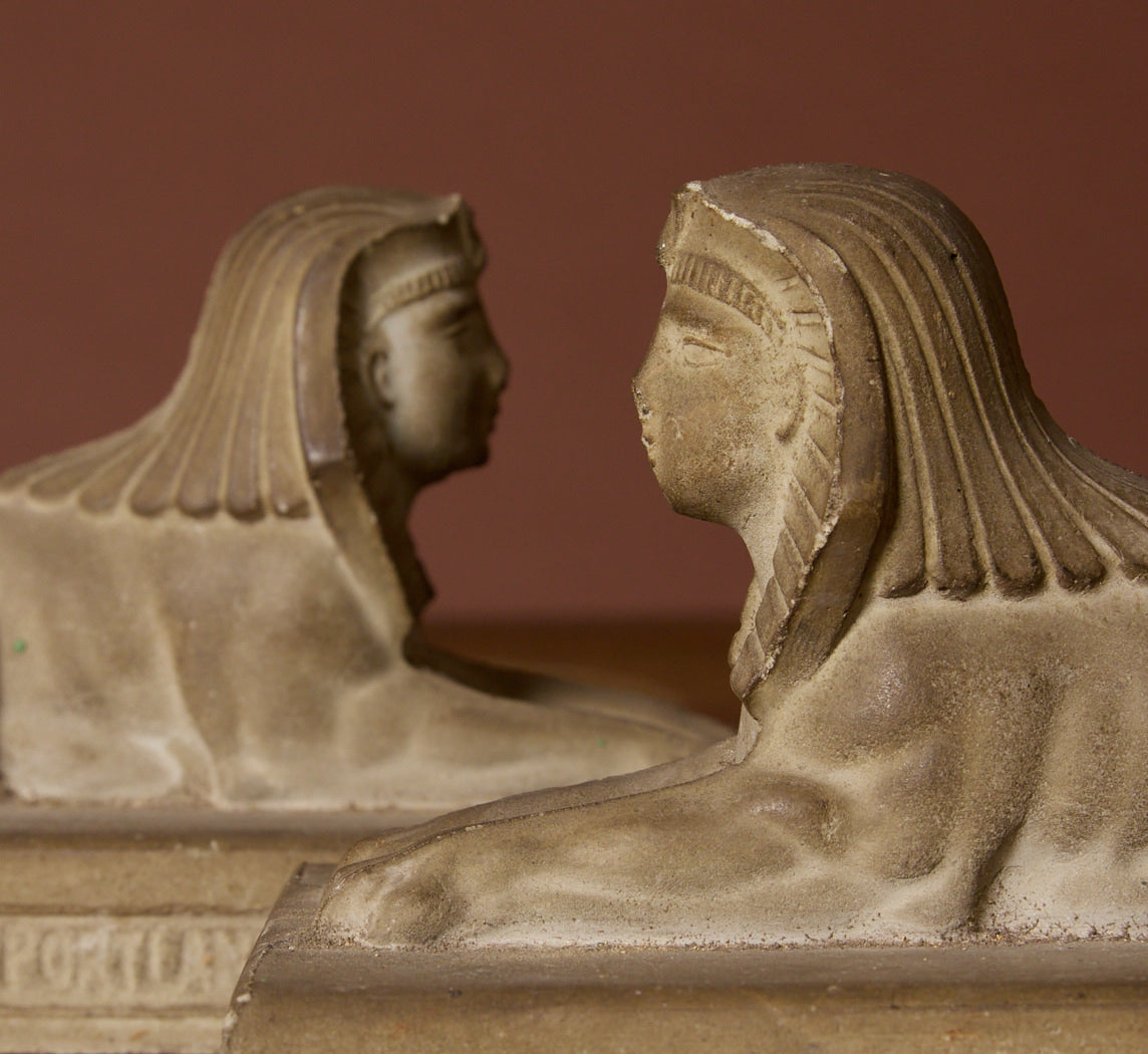 PAIR OF CAST STONE SPHINX BOOKENDS