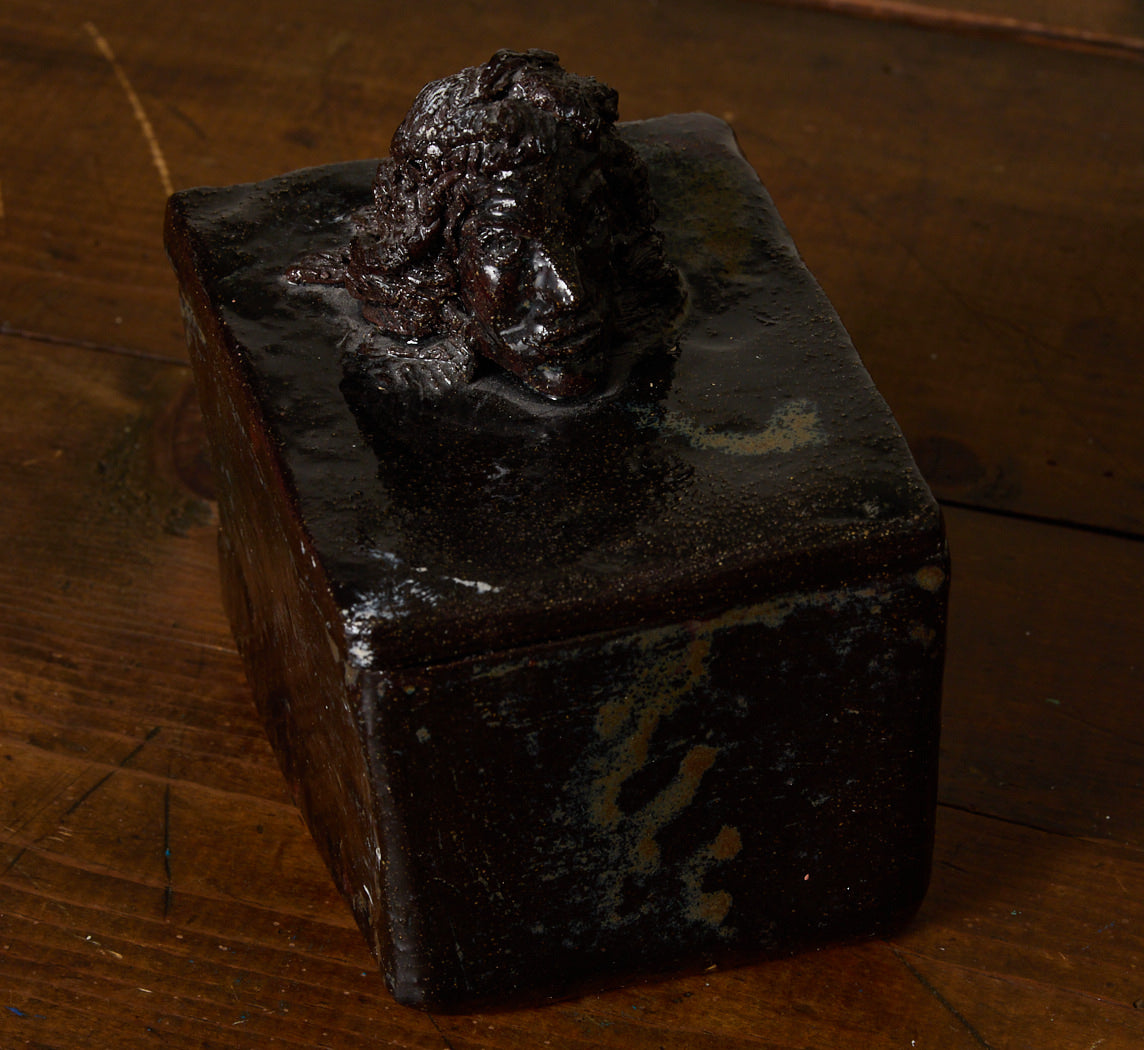 BLACK CERAMIC FIGURE BOX WITH BUST