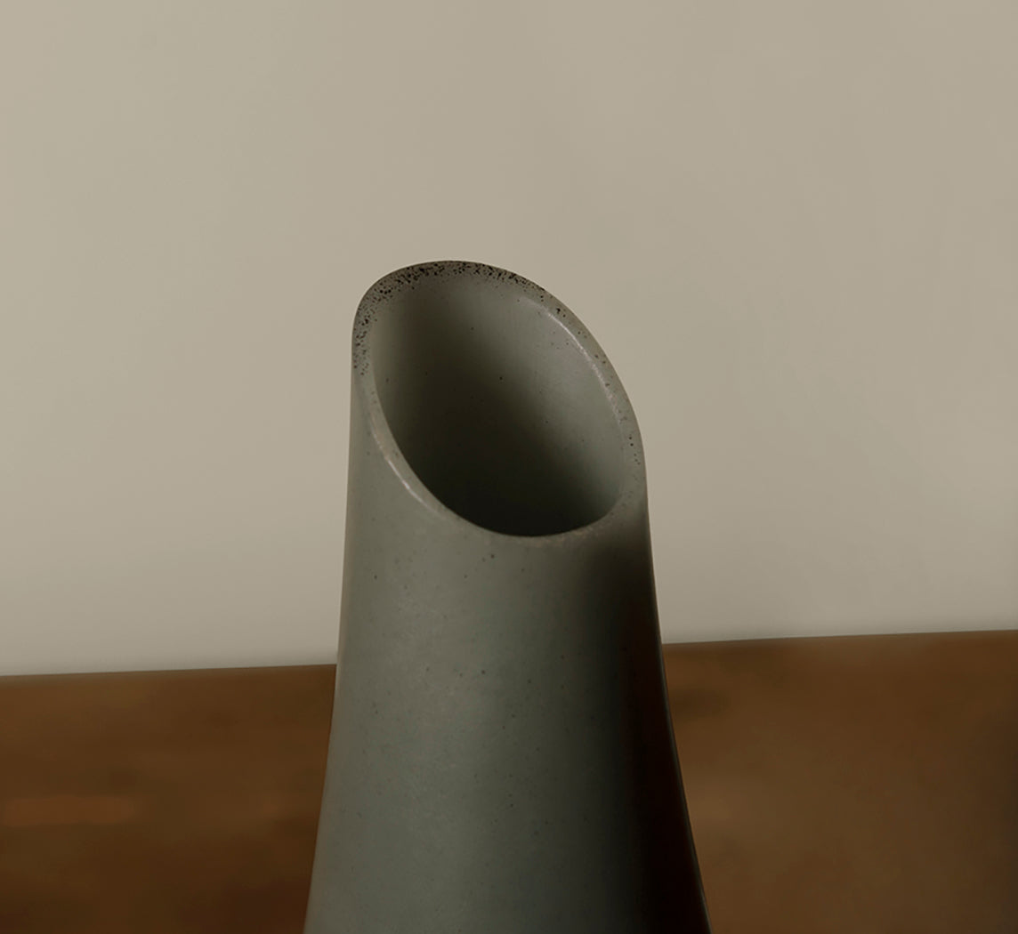 HANDS WAX VASE IN STORM