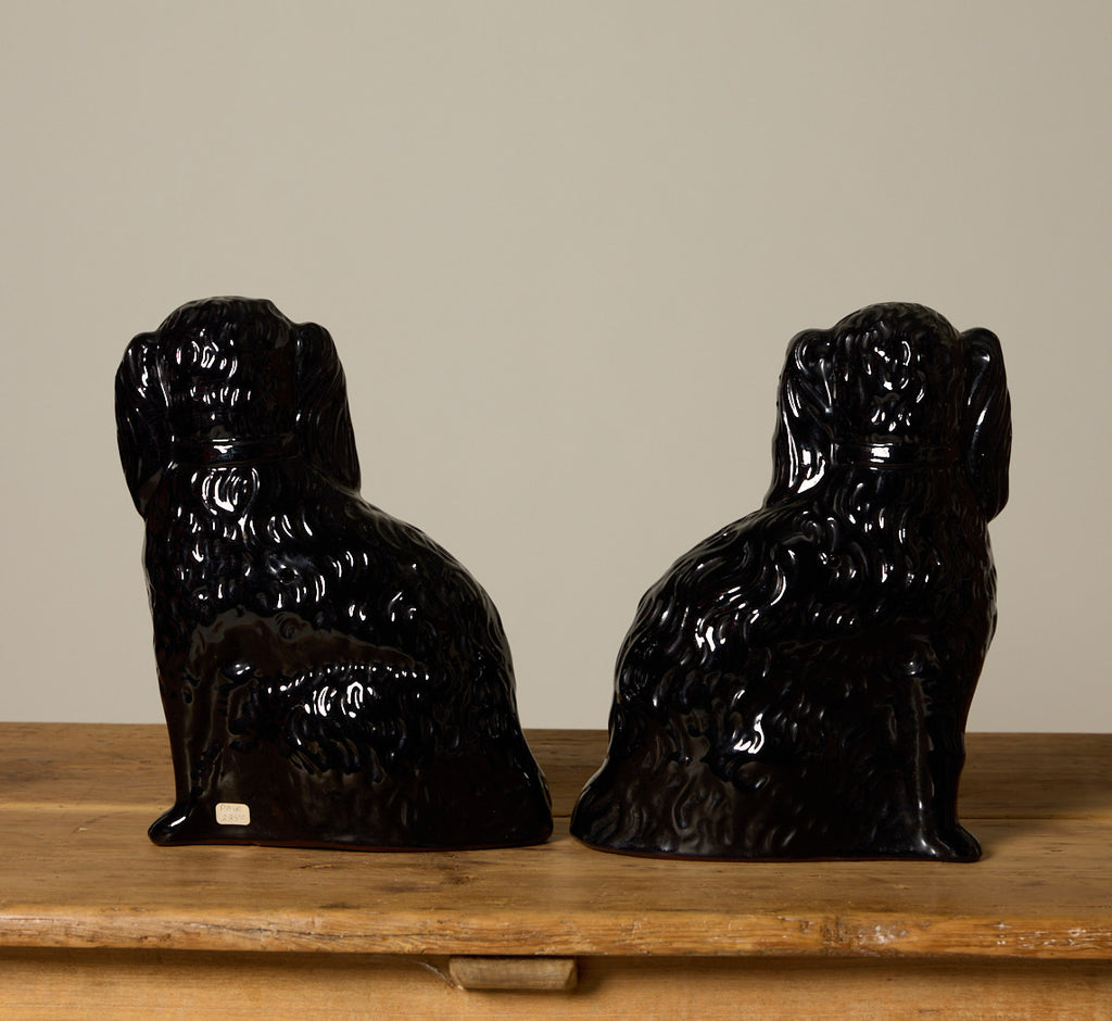 PAIR OF BLACK STAFFORDSHIRE SPANIEL FIGURES