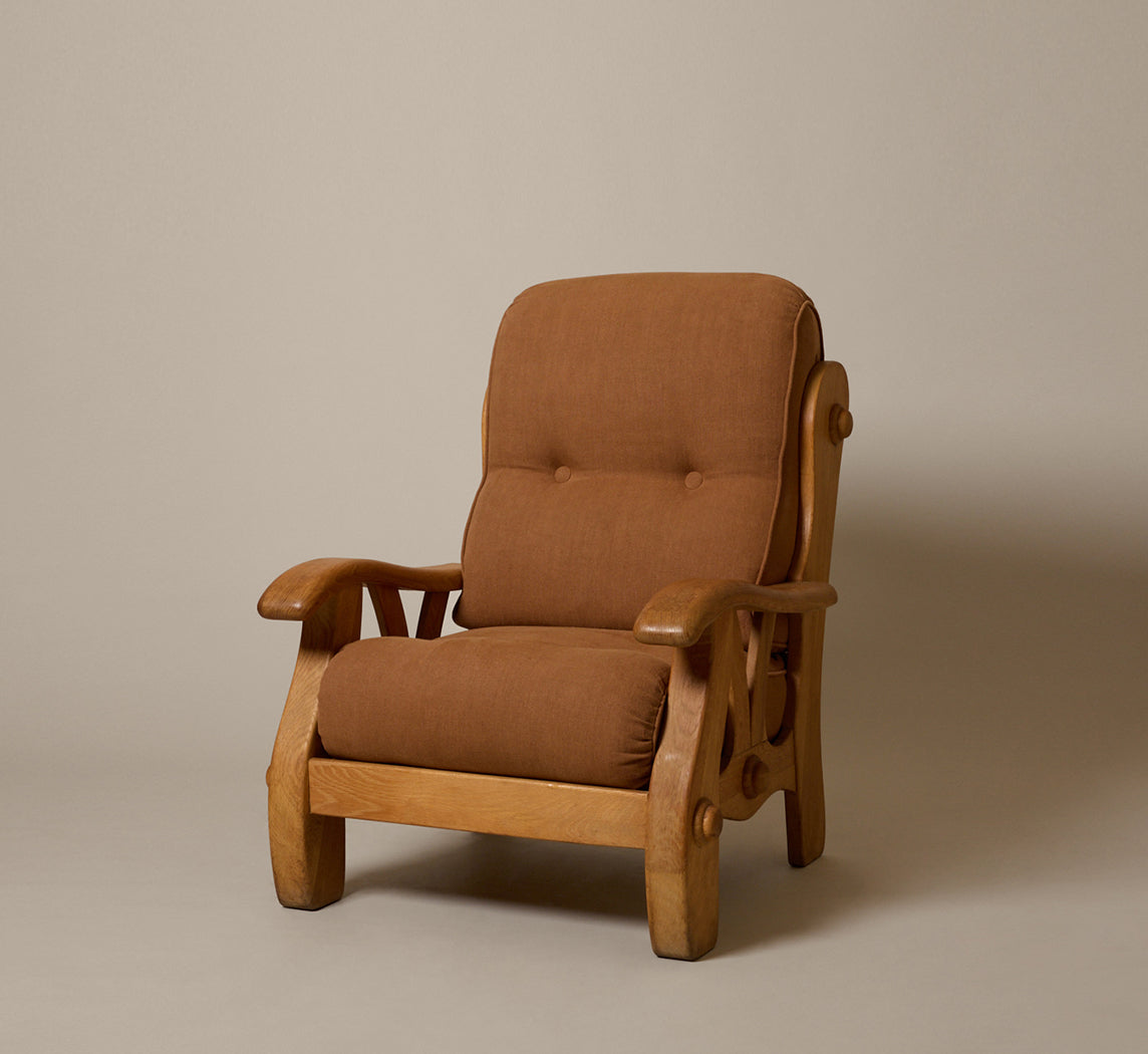 PAIR OF 1960S SCULPTURAL HEAVY OAK LOUNGE CHAIRS WITH MOKUM COPPER LINEN CUSHIONS