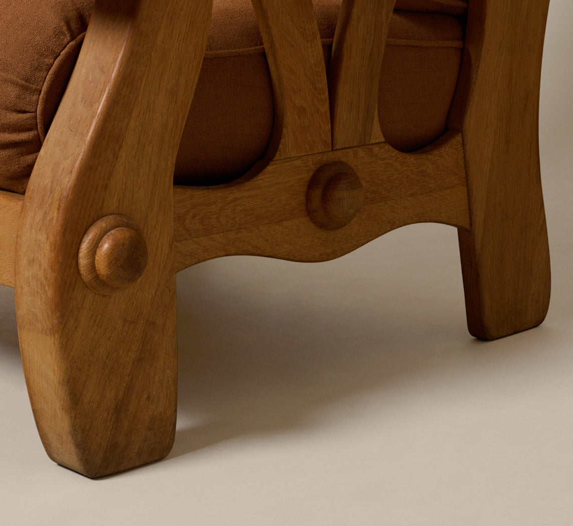 PAIR OF 1960S SCULPTURAL HEAVY OAK LOUNGE CHAIRS WITH MOKUM COPPER LINEN CUSHIONS
