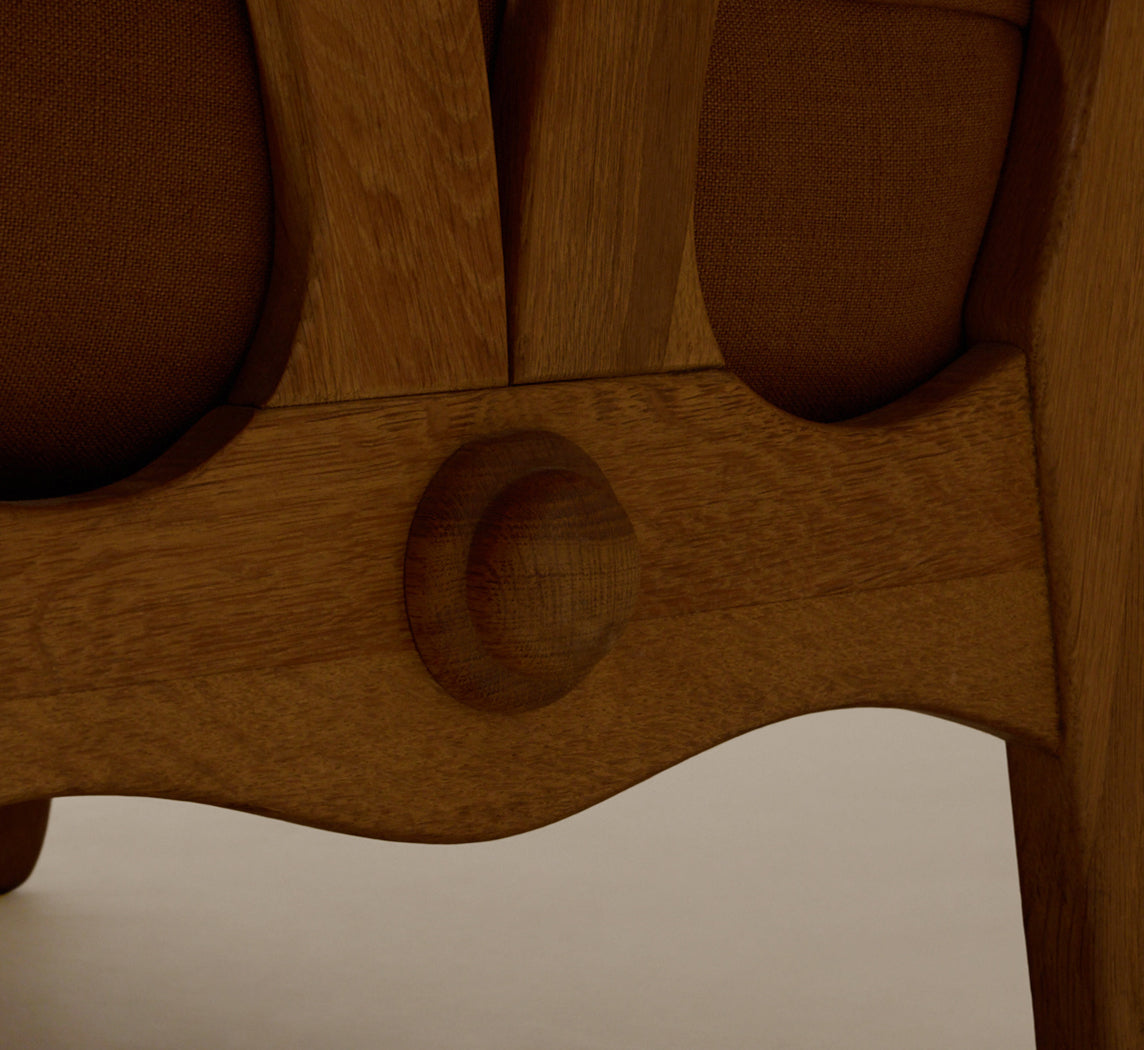 PAIR OF 1960S SCULPTURAL HEAVY OAK LOUNGE CHAIRS WITH MOKUM COPPER LINEN CUSHIONS