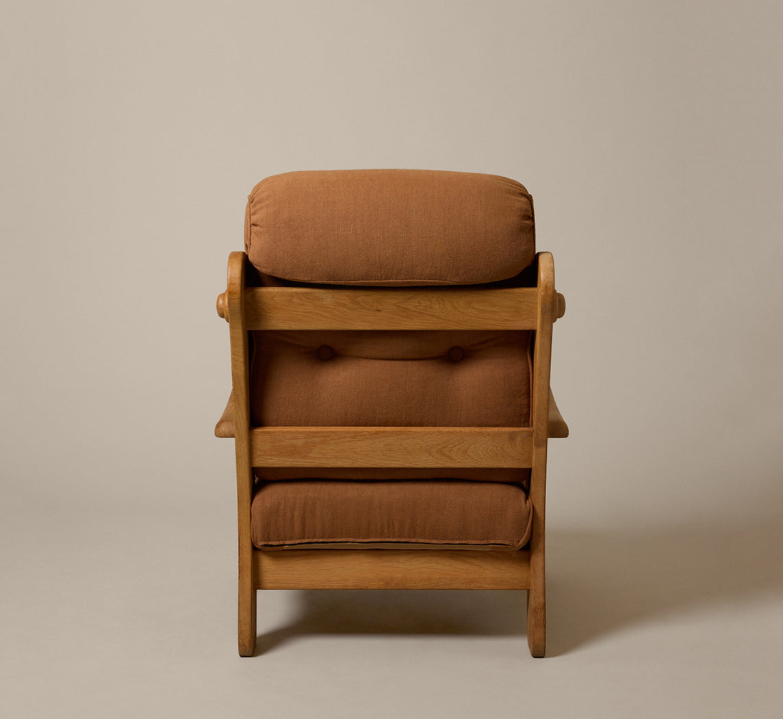PAIR OF 1960S SCULPTURAL HEAVY OAK LOUNGE CHAIRS WITH MOKUM COPPER LINEN CUSHIONS