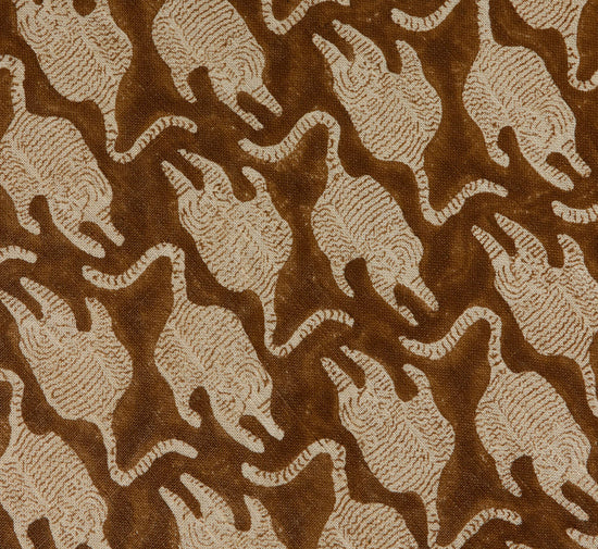 pierce-ward-circle-ottoman-in-vintage-tiger-block-print-pierce-ward