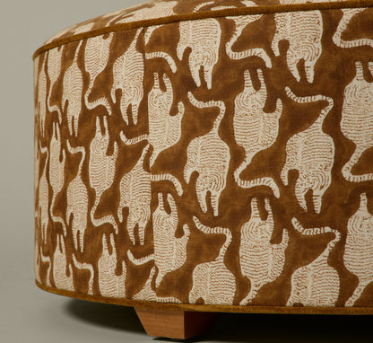 PIERCE & WARD CIRCLE OTTOMAN IN VINTAGE TIGER BLOCK PRINT