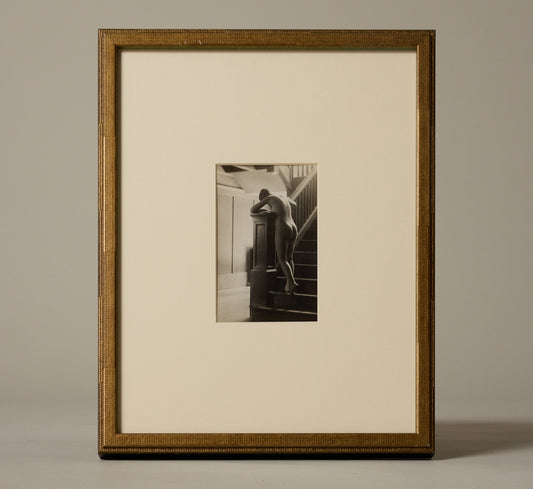 1920S  NUDE WOMAN ON STAIRS