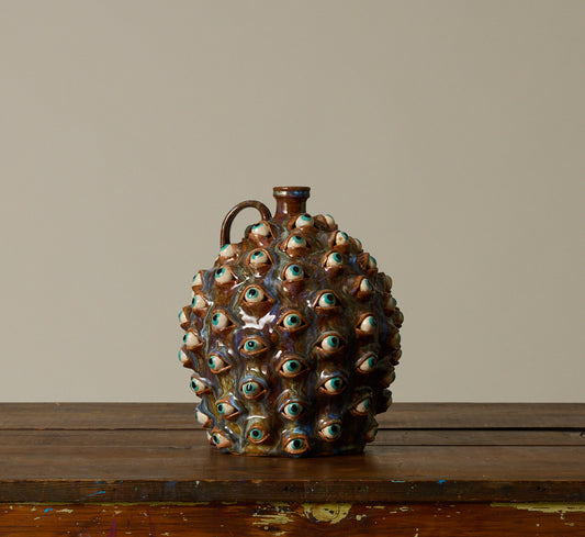 20TH CENTURY FOLK ART POTTERY EYEBALL JUG
