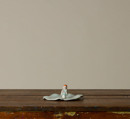 ABRA CERAMIC FIGURINE DISH - EGGSHELL BLUE GLAZE WITH WAVY RIM