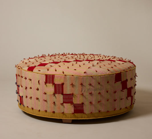 PIERCE & WARD CIRCLE OTTOMAN IN ANTIQUE QUILT