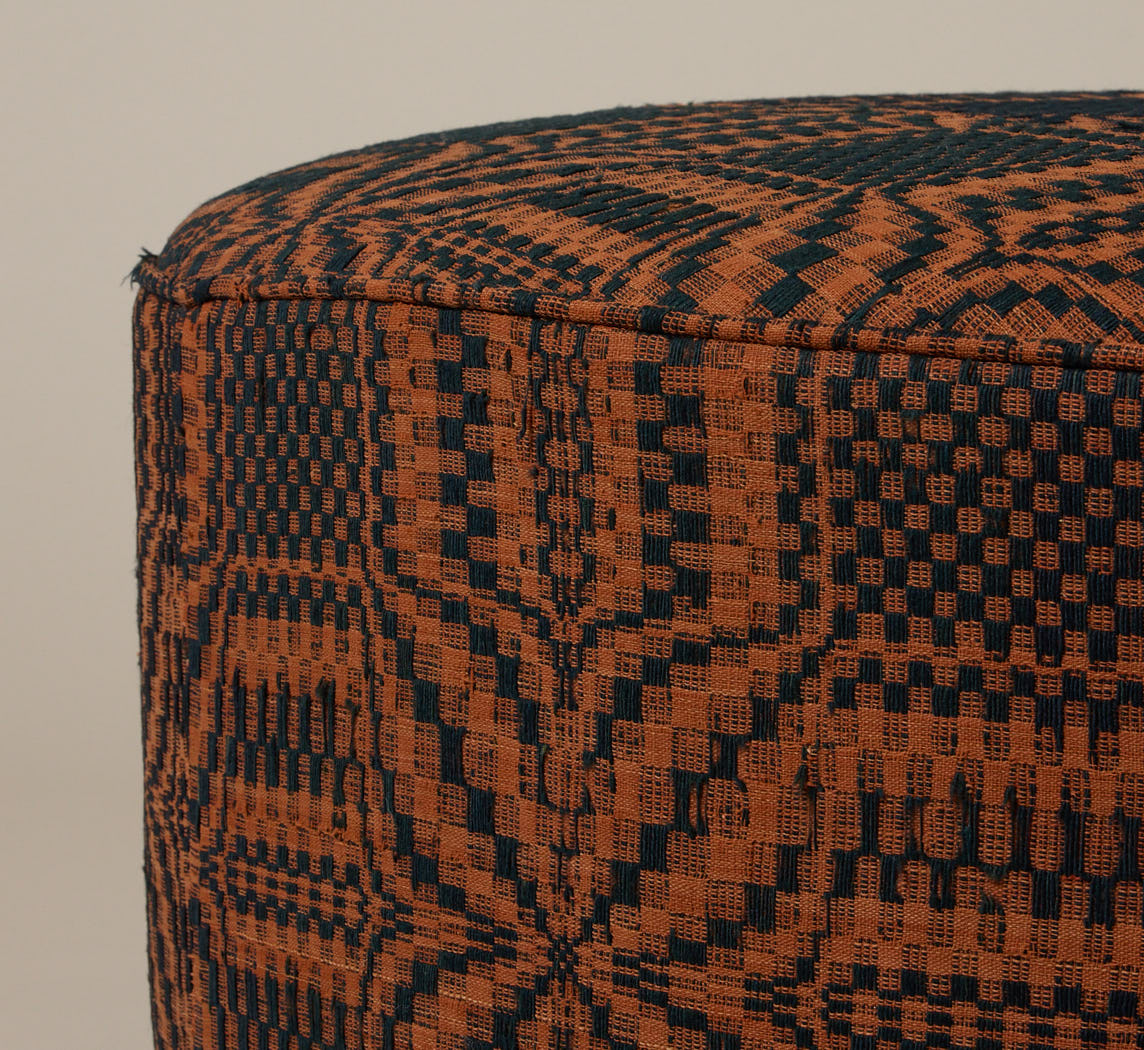PIERCE & WARD CIRCLE OTTOMAN IN AMERICAN COVERLET