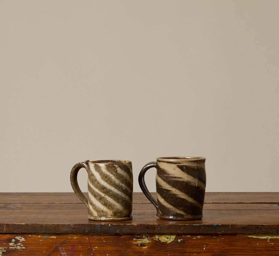 PAIR OF VINTAGE EARTHENWARE SWIRL MUGS