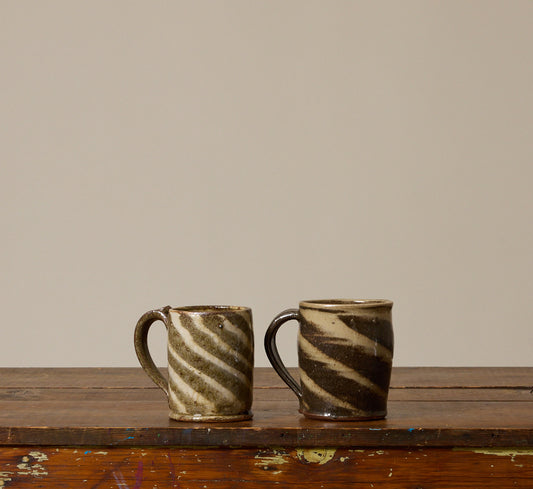PAIR OF VINTAGE EARTHENWARE SWIRL MUGS