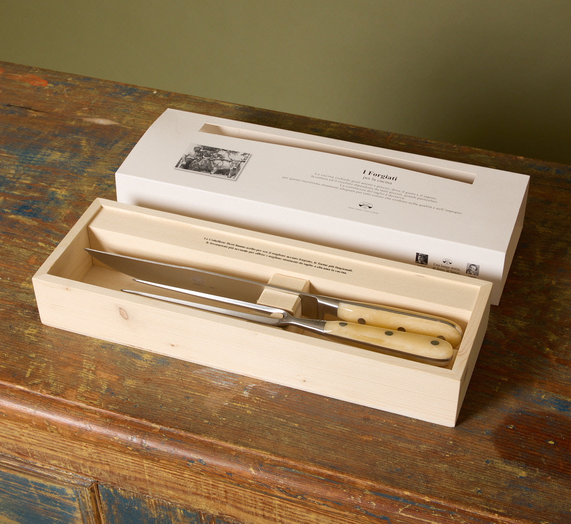 CARVING SET WITH CREAM LUCITE HANDLE BY COLTELLERIE BERTI