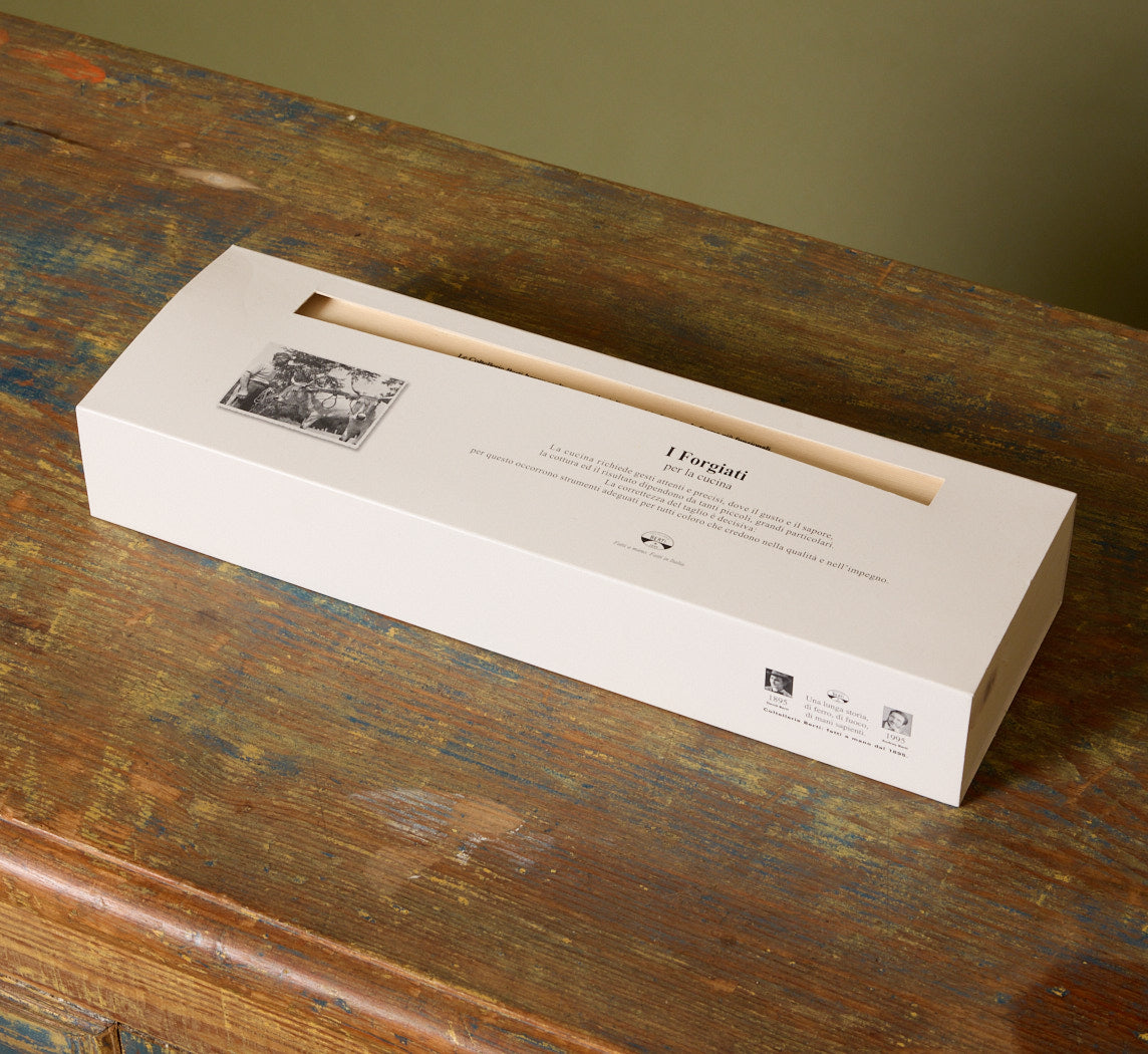 CARVING SET WITH CREAM LUCITE HANDLE BY COLTELLERIE BERTI