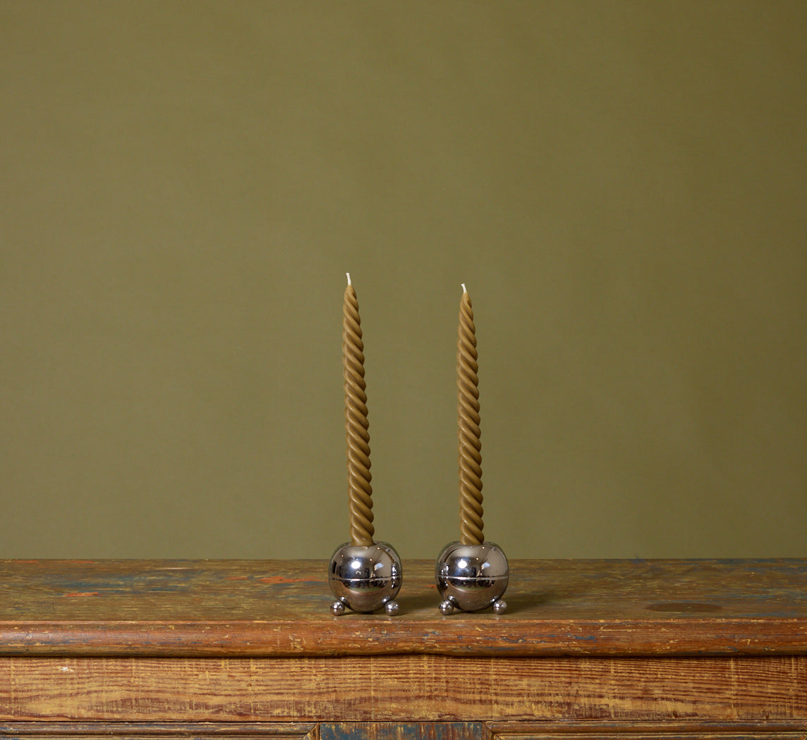 PAIR OF MIDCENTURY FOOTED ORB CHROME CANDLESTICK HOLDERS