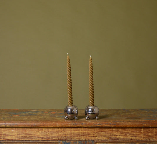 PAIR OF MIDCENTURY FOOTED ORB CHROME CANDLESTICK HOLDERS