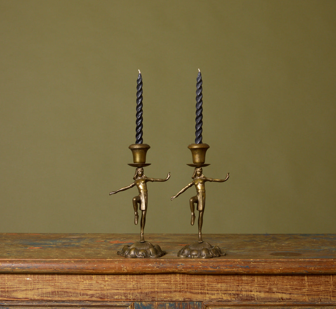 PAIR OF 1920S DANCING EGYPTIAN FIGURE CANDLESTICK HOLDERS