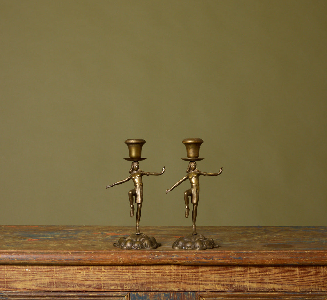 PAIR OF 1920S DANCING EGYPTIAN FIGURE CANDLESTICK HOLDERS