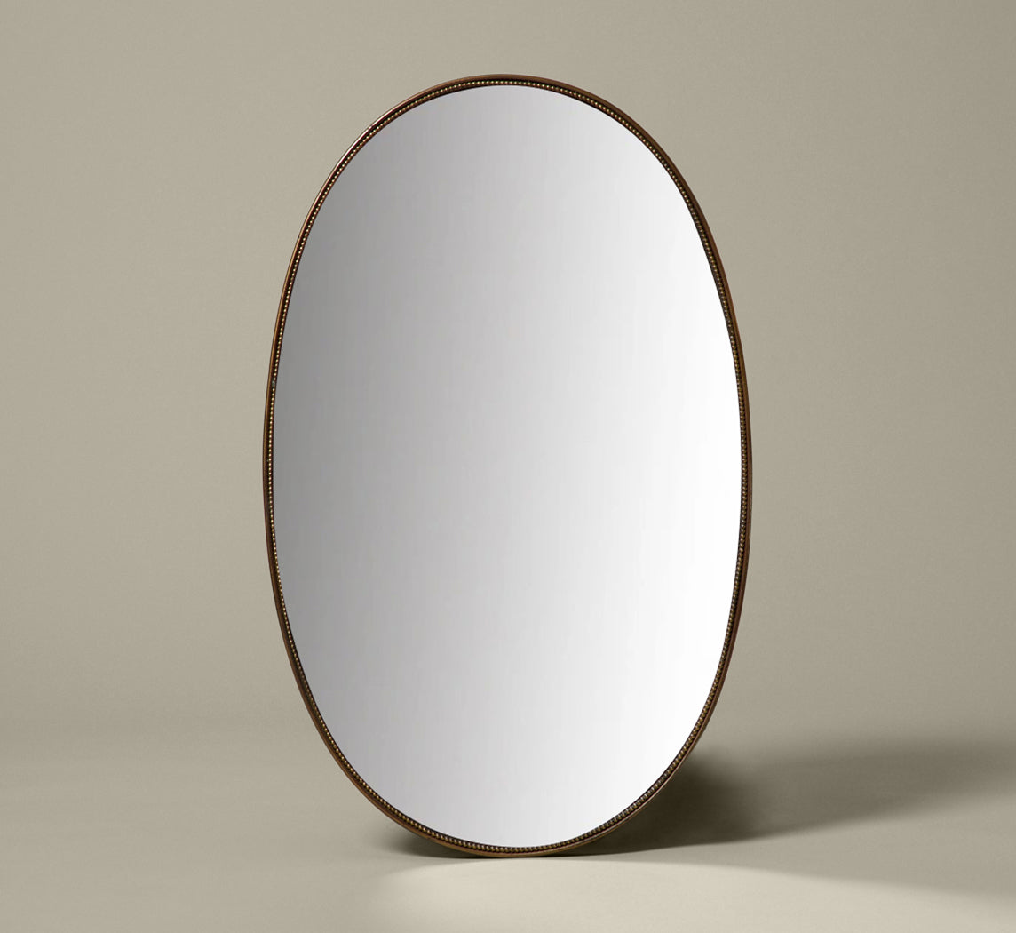 VINTAGE OVAL MIRROR WITH BEADED FRAME