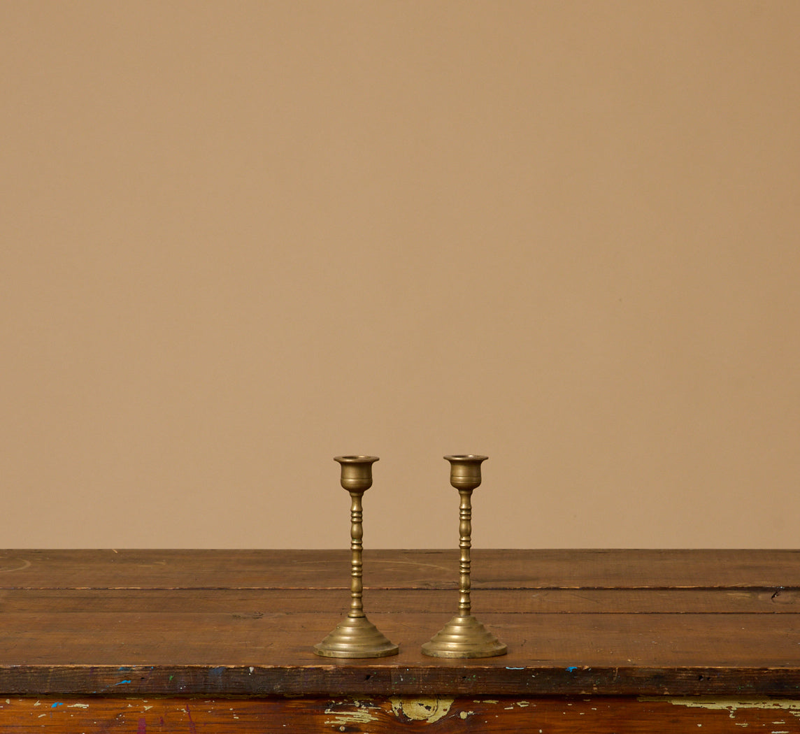 PAIR OF ANTIQUE BRASS RIBBED CANDLESTICK HOLDERS