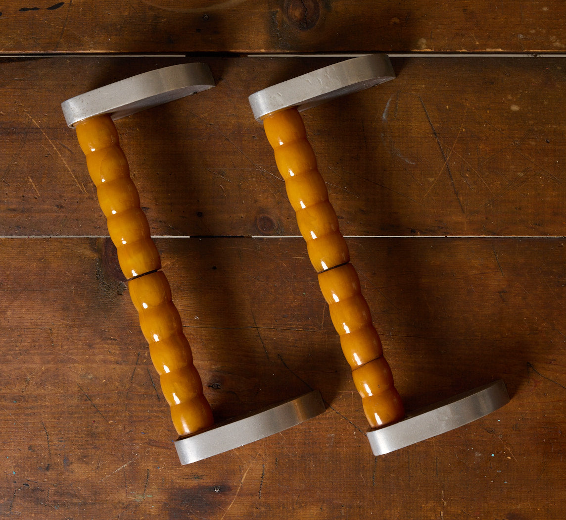 PAIR OF 1930S ART DECO AMBER & ALUMINUM DOOR PULLS