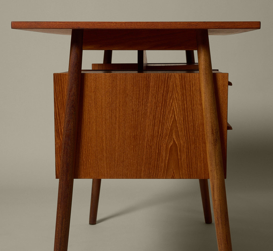 1960S DANISH ASYMMETRICAL TEAK DESK BY GUNNAR NIELSEN