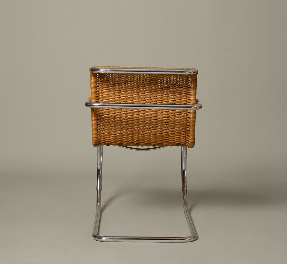 SET OF 8 CANE & CHROME CANTILEVER CHAIRS ATTR. TO MIES VAN DER ROHE