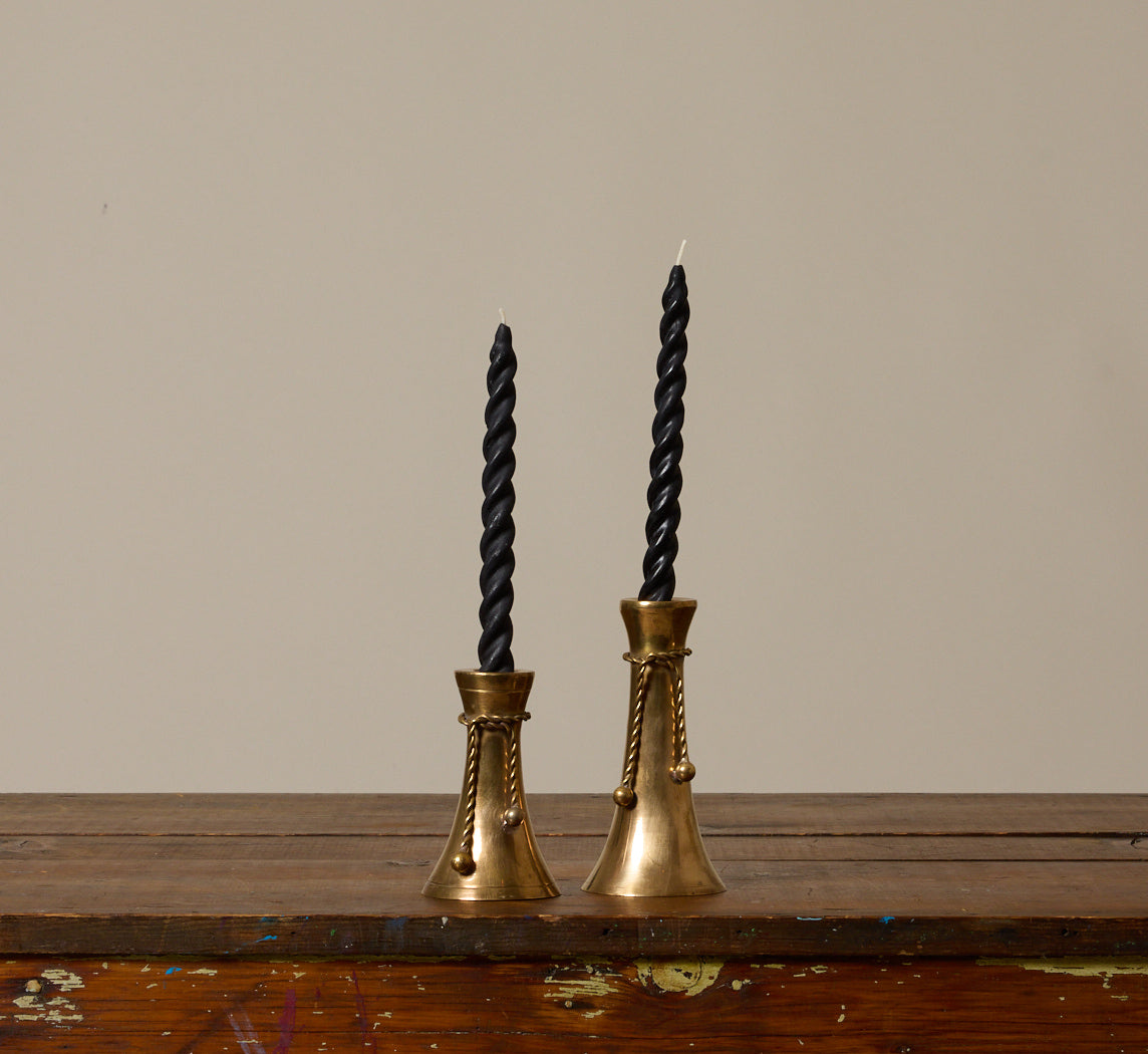 PAIR OF ASYMMETRICAL BRASS TASSEL CANDLESTICK HOLDERS