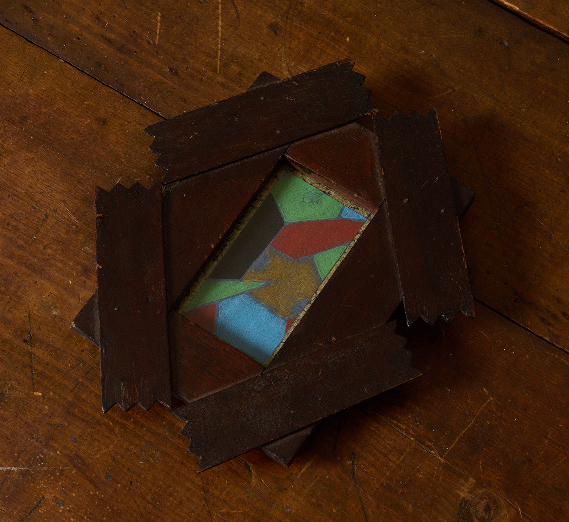 EARLY 20TH CENTURY PETITE TRAMP ART FRAMED POLYCHROME PRINT