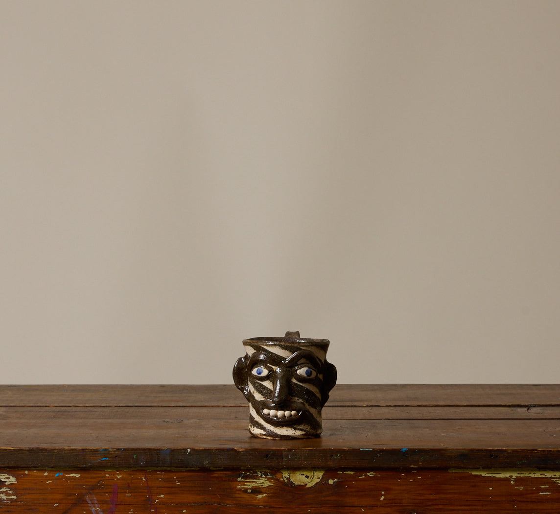 AMERICAN FOLK ART EARTHENWARE SWIRL FACE MUG