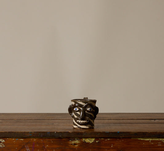 AMERICAN FOLK ART EARTHENWARE SWIRL FACE MUG