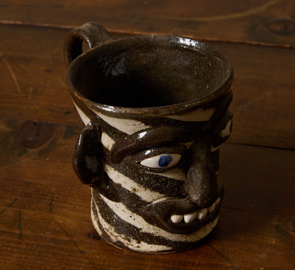 AMERICAN FOLK ART EARTHENWARE SWIRL FACE MUG