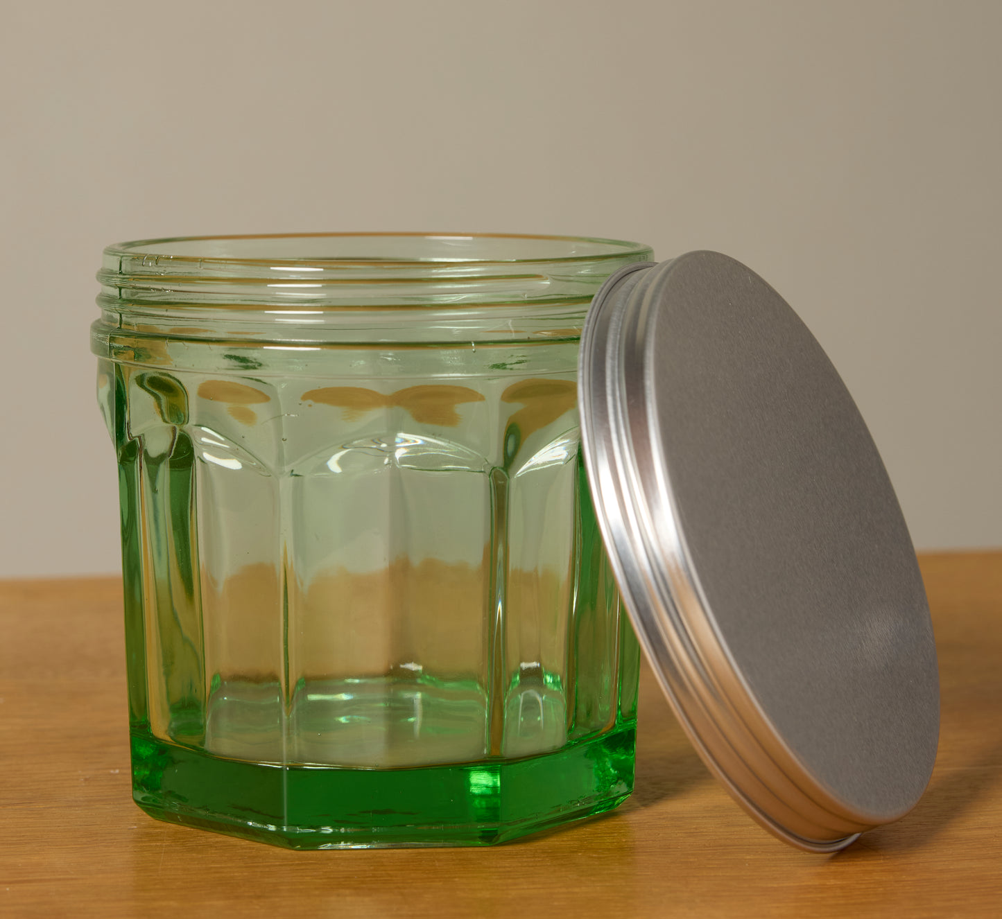 SMALL GREEN GLASS JAR WITH LID