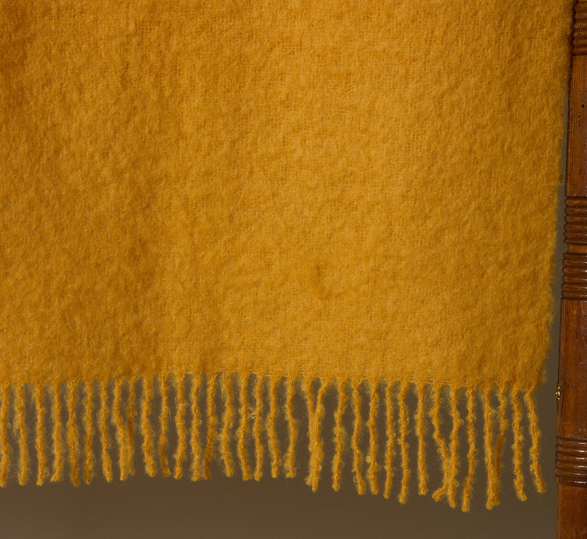 MOHAIR ROLLED FRINGES BLANKET IN OCHRE